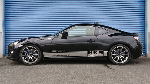 HKS HIPERMAX S coilover kit installed on a Mazda ZN6, showcasing adjustable suspension components and performance suspension setup.