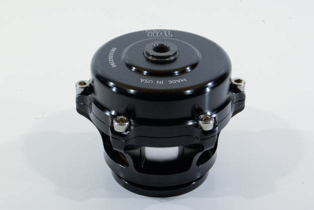 Black TiALSport Blow Off Valve with 8 PSI spring for turbocharged engines, showing the valve's compact design and pressure adjustment features.