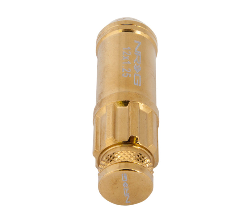 NRG 700 Series M12 x 1.25 steel lug nut set with dust cap cover, locks, and socket in chrome gold finish.