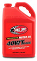 Red Line 40WT Race Oil gallon container, high-performance motor oil designed for racing engines with red and black labeling.