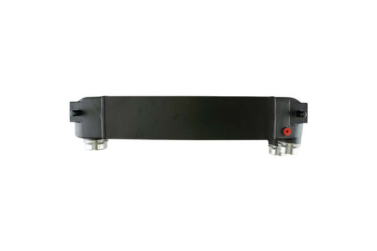 Black Turbosmart intercooler for Ford Ranger Raptor V6 Ecoboost, shown mounted with cooling fins and inlet connections.