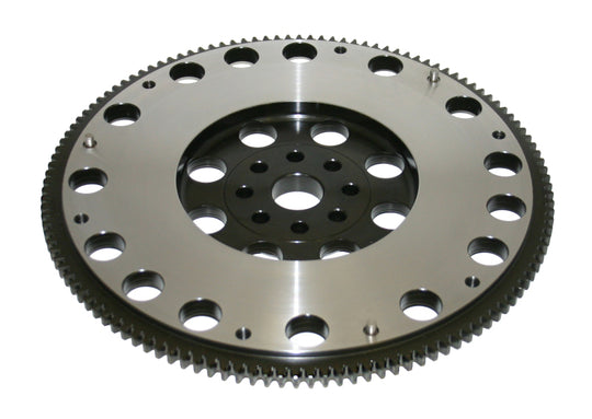 Steel flywheel for Nissan CA18DET engine by Competition Clutch, featuring a durable metal construction and precise machining.