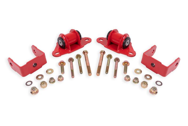 Red BMR Chevrolet Corvette transmission and differential mount with bushings, designed for 2014-2019 model years, mounted on a vehicle.