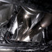 Stainless Works 2017 F-150 Raptor 3.5L downpipe with high-flow cats and factory connection, installed on the vehicle's exhaust system.
