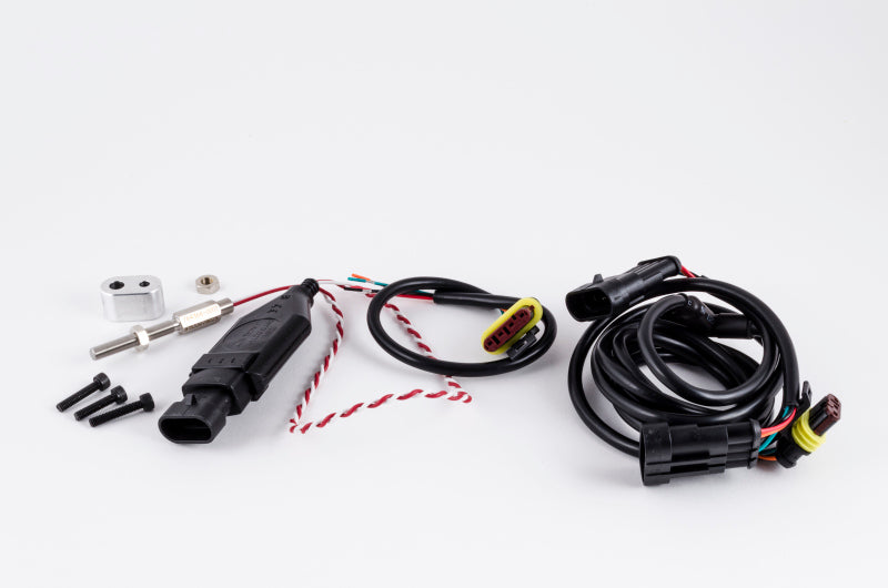 Garrett Pro speed sensor component for gauges, shown as a small electronic device with wiring for automotive performance use.