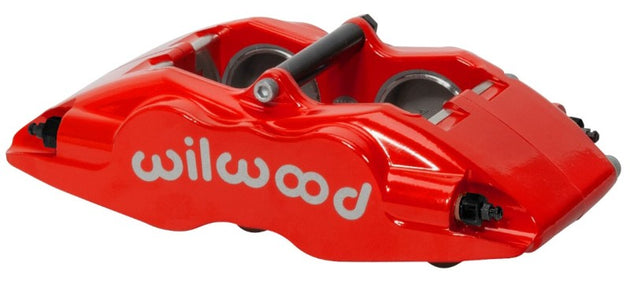 Wilwood Forged Superlite brake caliper with 1.38-inch pistons and 1.25-inch disc in red for high-performance braking systems.