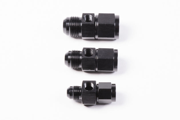 Radium Engineering 10AN inline fitting connecting to a 1/8NPT female fitting, metal construction, detailed close-up.