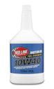 Red Line 10W40 motor oil quart bottle with orange and black label, designed for engine lubrication and maintenance.