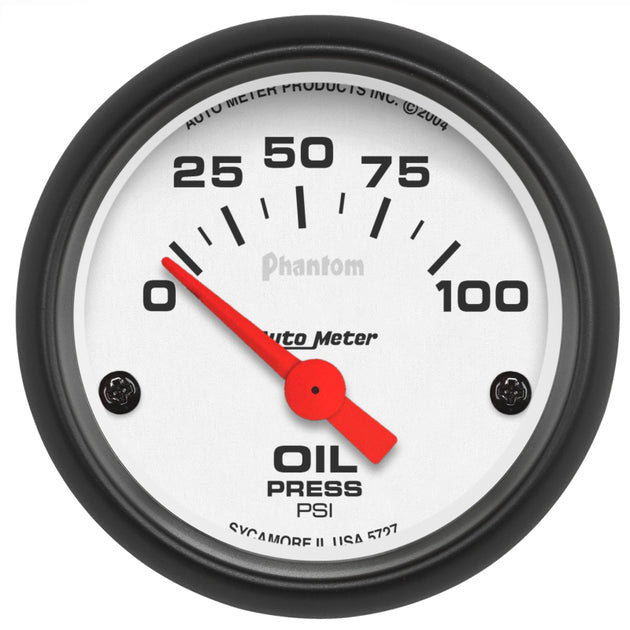 AutoMeter Phantom 52mm electric oil pressure gauge showing dial with 0-100 PSI measurement and black casing.