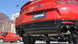 Black CORSA Performance axle-back exhaust for Chevrolet Camaro SS 2017-2024 with 6.2L V8 engine, featuring dual exhaust tips.