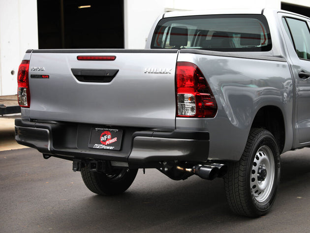 aFe Vulcan Series 3-inch stainless steel catback exhaust with black tip for Toyota Hilux 2.4/2.8L diesel, rear-side exit design