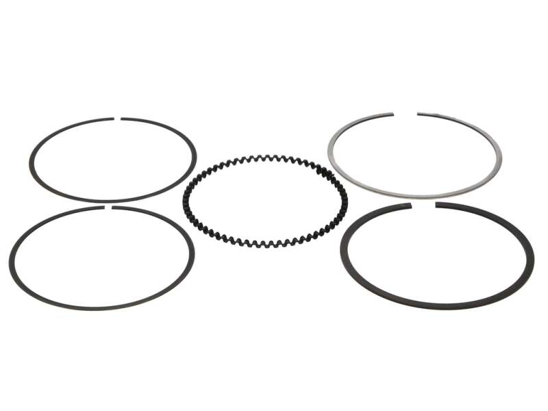 Wiseco piston ring set with 84.25mm rings, featuring 1.0mm, 1.2mm, and 2.8mm thicknesses, displayed on a shelf.