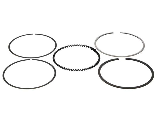 Wiseco piston ring set with 84.25mm rings, featuring 1.0mm, 1.2mm, and 2.8mm thicknesses, displayed on a shelf.