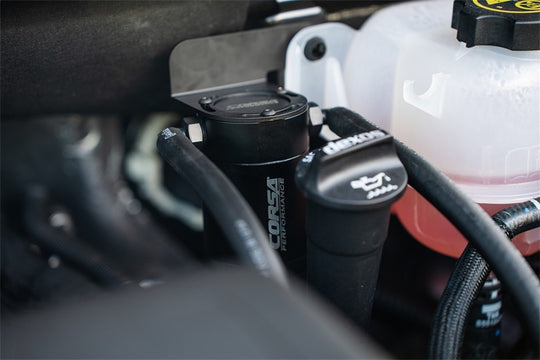 CORSA Performance aluminum oil catch can for Chevrolet Silverado, Tahoe, Yukon, Sierra, Suburban, and Denali models from 2019-2025.