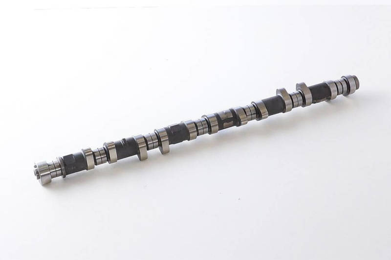 HKS 93-98 Toyota Supra turbo 272 exhaust camshaft showing metal cam lobe and gear for high-performance engine upgrade