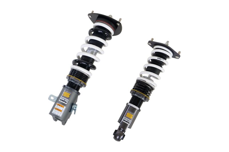 HKS HIPERMAX S coilover suspension kit installed on Subaru WRX STI, showing the adjustable shock absorbers and coil springs.