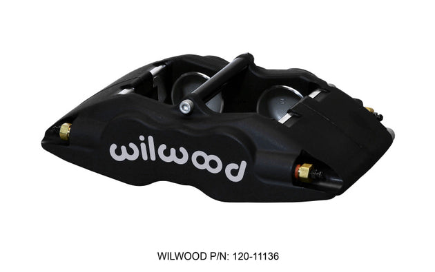 Wilwood Forged Superlite brake caliper with 1.75-inch pistons and 1.25-inch disc for high-performance braking.
