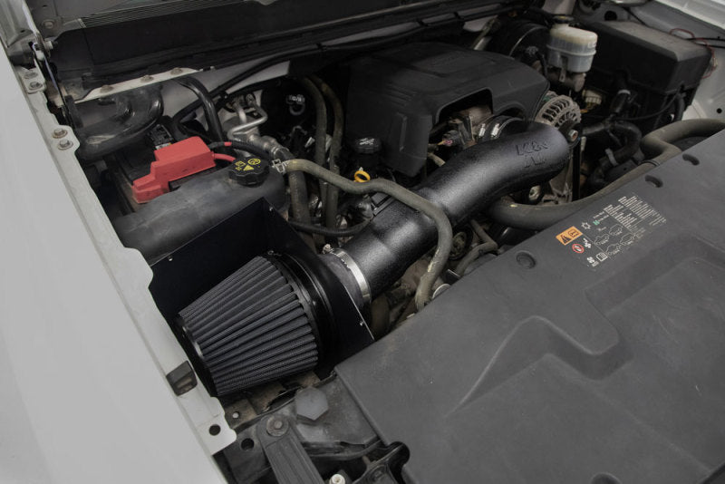 K&N Engineering performance cold air intake system for Chevrolet V8 engines 4.8L to 6.2L, shown installed in engine bay.