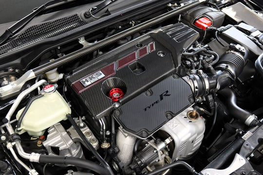 HKS Honda Civic Type R FL5 FK8 dry carbon fiber engine cover installed on engine bay, showcasing sleek, lightweight design.