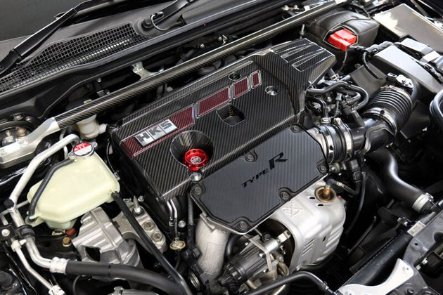 HKS Honda Civic Type R FL5 FK8 dry carbon fiber engine cover installed on engine bay, showcasing sleek, lightweight design.