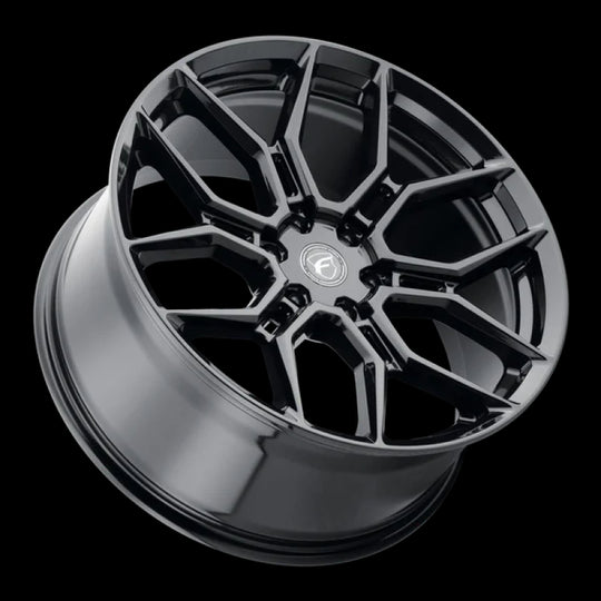 Forgestar F14 17x10 cast wheel in gloss black with 6x135 bolt pattern, ET42 offset, 7.15-inch backspacing, and 87.1 bore