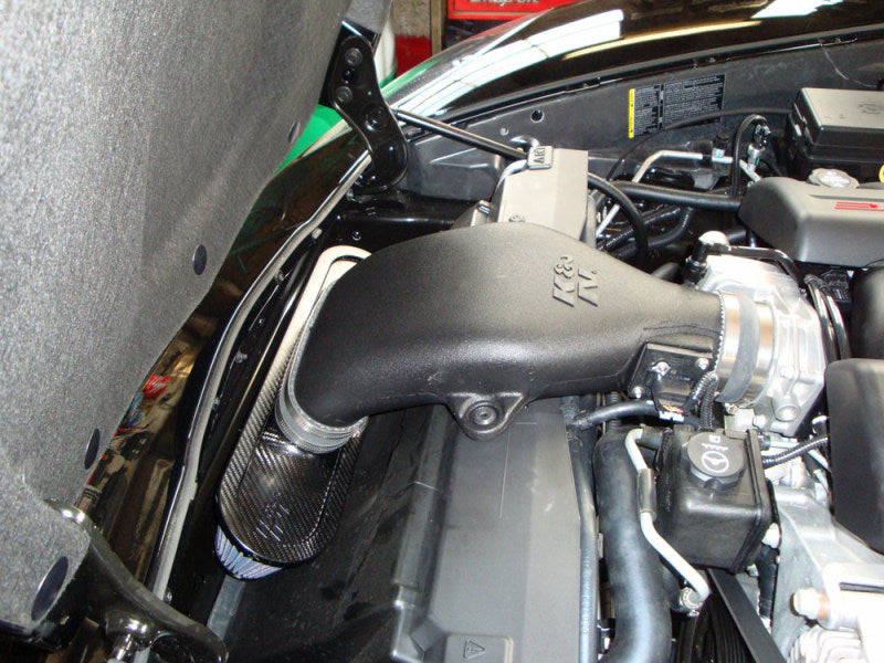K&N Engineering cold air intake for 2008-2009 Chevy Corvette 6.2L V8 engine, showing the sleek intake tube and filter.
