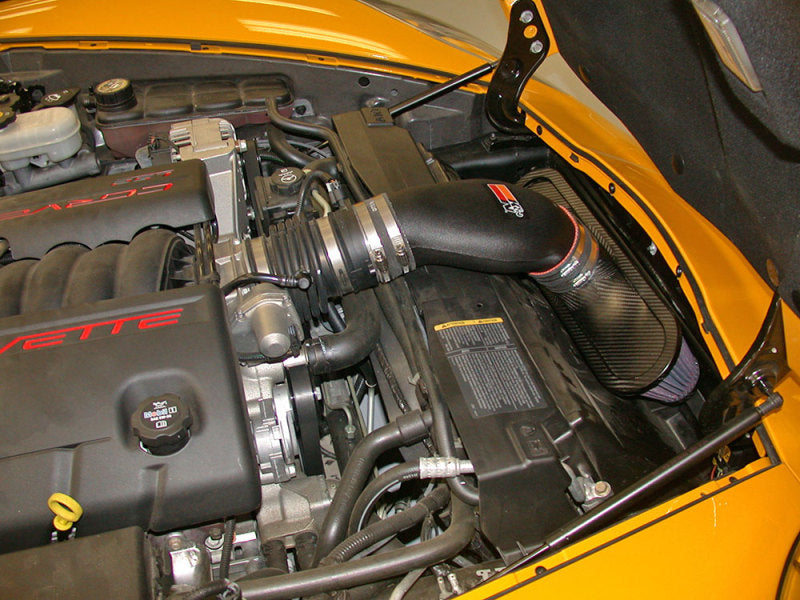 K&N Engineering Chevrolet Corvette V8-6.0L AirCharger cold air intake system with filter and intake tube, installed in engine bay.