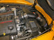 K&N Engineering Chevrolet Corvette V8-6.0L AirCharger cold air intake system with filter and intake tube, installed in engine bay.