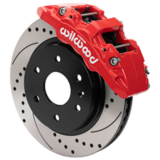 Wilwood Aero6-DM front brake kit for 2019-2021 Chevy Silverado and GMC Sierra, featuring red calipers and large brake rotors.
