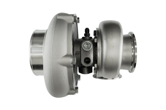 Turbosmart 6262 water-cooled V-band inlet/outlet external wastegate on turbocharger, with polished metal components and fittings.