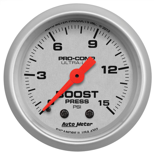 AutoMeter Ultra-Lite 52mm mechanical boost gauge showing 0-15 PSI pressure dial in a close-up shot.