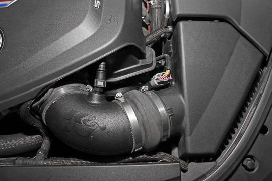 K&N 57 Series FIPK cold air intake kit for Cadillac CTS-V V8 6.2L engine, featuring high-flow performance air filter and intake tubing.