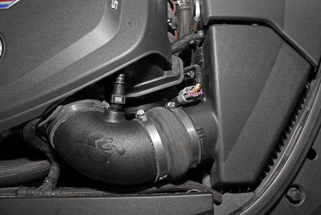 K&N 57 Series FIPK cold air intake kit for Cadillac CTS-V V8 6.2L engine, featuring high-flow performance air filter and intake tubing.