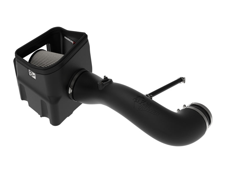 aFe Magnum FORCE Stage-2 Pro Dry S cold air intake system installed in a 2009-2014 Chevrolet Silverado or GMC Yukon engine bay.