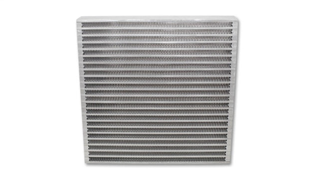 Vibrant universal oil cooler core measuring 12x12x2 inches with vibrant fins for efficient engine cooling.