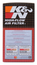 K&N Engineering round drop-in air filter with 5-7/8 inch outer diameter and 4-7/8 inch inner diameter, new and clean.
