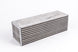 Garrett H2O / Air CAC intercooler for 750 HP, 3.80x3.80x11.70 inches, with metal fins and inlet outlets.