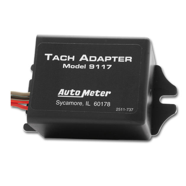 AutoMeter tachometer adapter for distributorless ignition systems, shown with connection ports and wiring for automotive gauges.