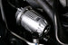 HKS Super SQV4 blow off valve installed on a vehicle, showcasing its black metal body and venting ports for turbocharged engines