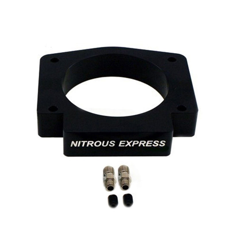 Nitrous Express 102mm 4-bolt LS nitrous plate showing metal plate with bolt holes for engine installation