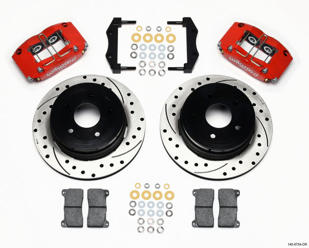 Wilwood Dynapro radial rear brake kit with 12.19-inch drilled red rotors installed on a 2004-2006 Pontiac GTO, showing the big brake components.