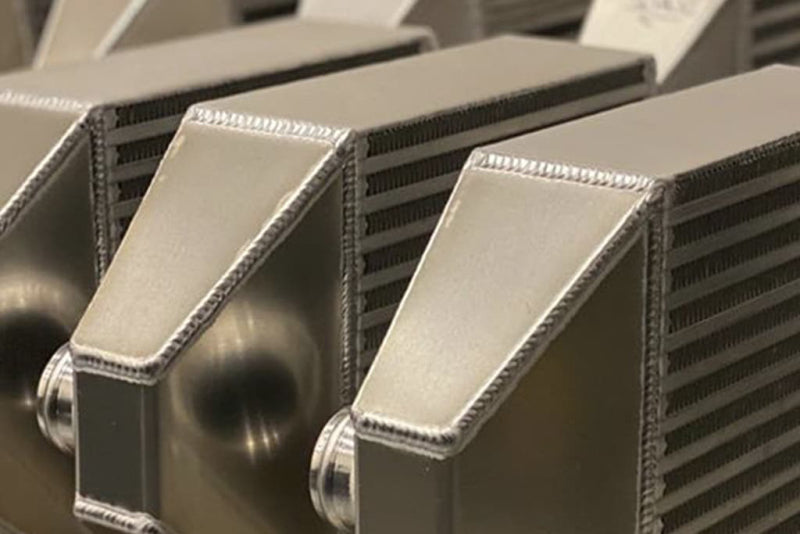 CSF high performance bar and plate intercooler core with 22-inch length, 12-inch height, and 3.5-inch width for automotive cooling.