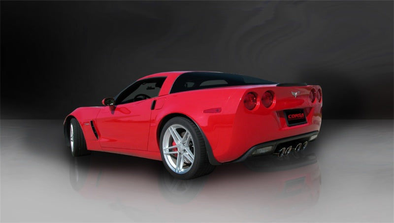 Black Corsa Performance axle-back exhaust for Chevrolet Corvette C6 Z06 2006-2013 with 7.0L V8 engine, showcasing polished tips and exhaust pipes.