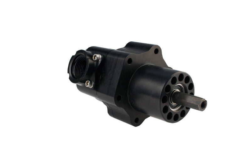 Aeromotive Atomic belt drive fuel pump installed in a vehicle engine compartment, showcasing its compact design and industrial build.