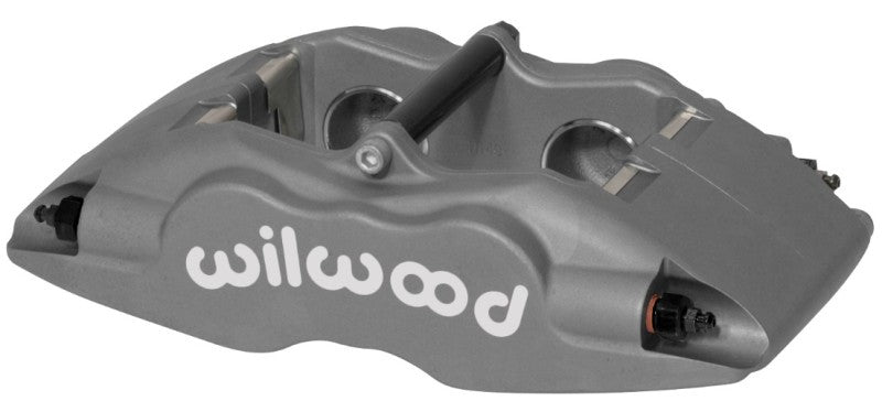Wilwood Forged Superlite brake caliper with 1.62-inch pistons and 1.25-inch disc for high-performance braking.