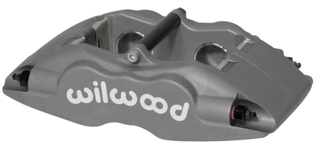 Wilwood Forged Superlite brake caliper with 1.62-inch pistons and 1.25-inch disc for high-performance braking.