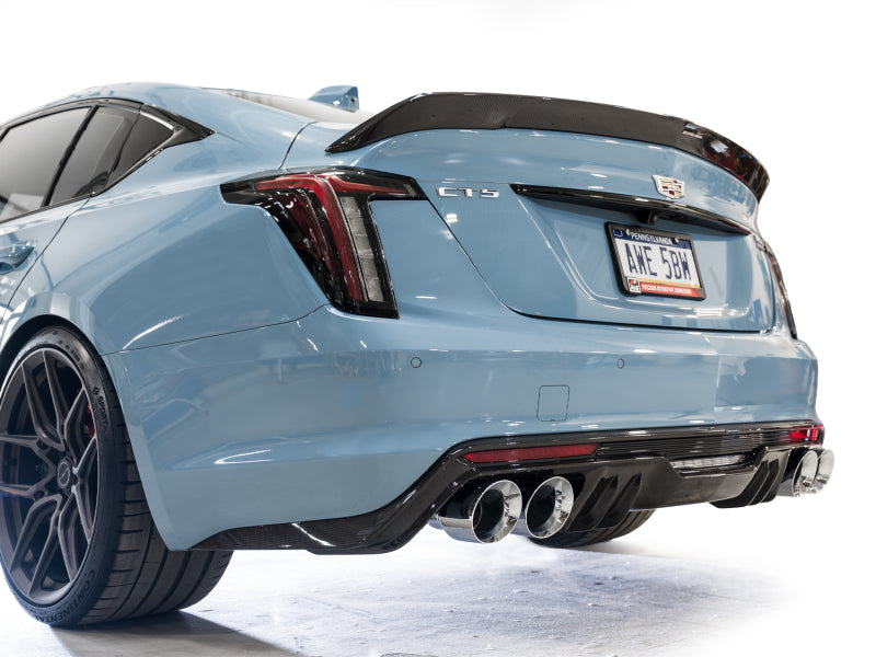 AWE Tuning Cadillac CT5-V Blackwing catback exhaust with chrome silver tips, showcasing the sleek, polished finish and dual exhaust outlets.