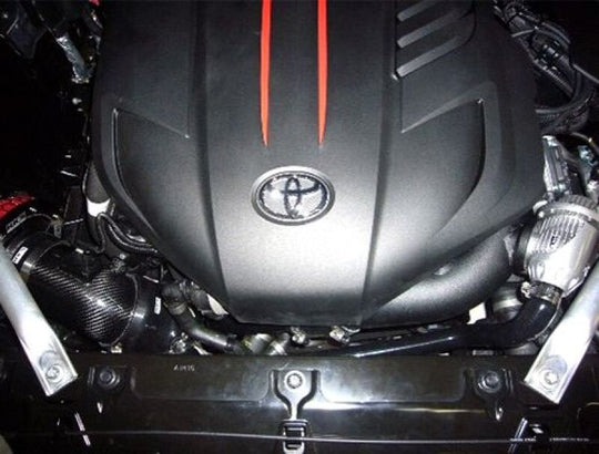 HKS SSQV IV blow off valve and return kit for Toyota GR Supra, showing the black HKS BOV with connecting hoses and fittings.
