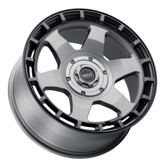 Weld Off-Road Ridge 17x9 satin gunmetal cast wheel with black ring, 5x114.3/127 bolt pattern, ET-12 offset, 78.1mm center bore.