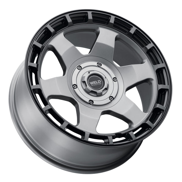 Weld Off-Road Ridge 17x9 satin gunmetal cast wheel with black ring, 5x114.3/127 bolt pattern, ET-12 offset, 78.1mm center bore.